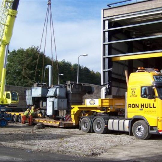 Industrial equipment being removed from a decomissioned facility